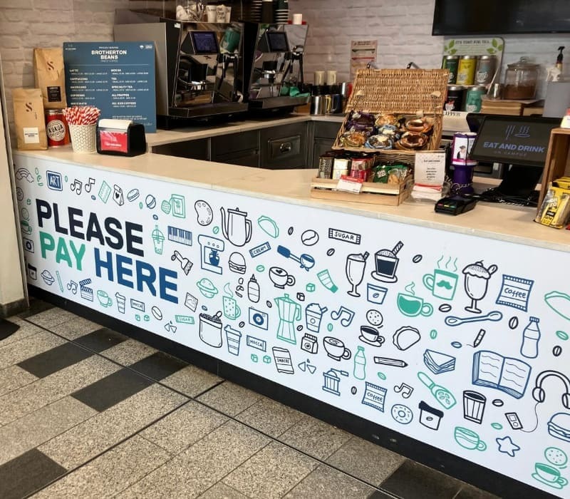 Striking large format graphics installed by Impression at the University of Salford’s Studio café in the New Adelphi Building.