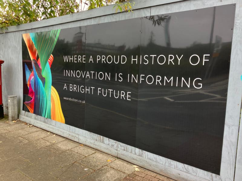 Installation of weather resistant dibond hoarding panels in Bolton town, by Impression for Bolton Council.