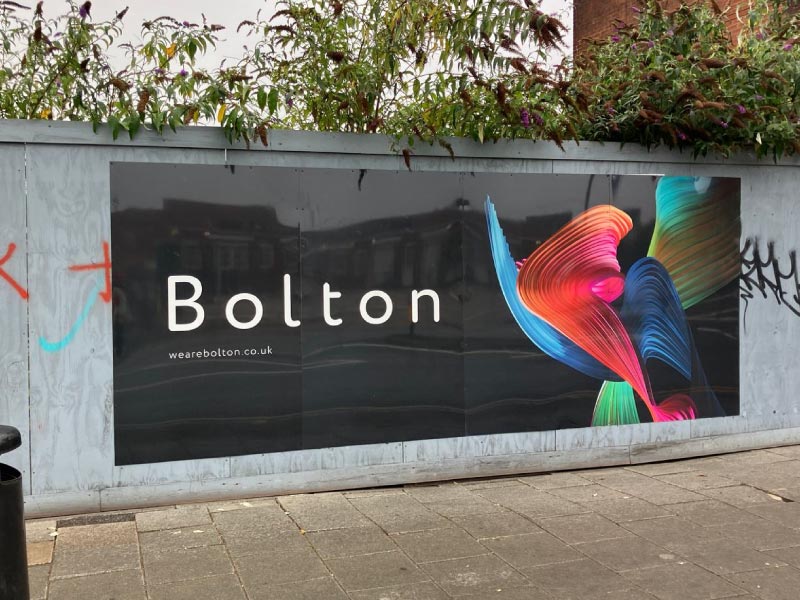 Branded dibond hoarding panels for Bolton Council’s We Are Bolton printed and installed.
