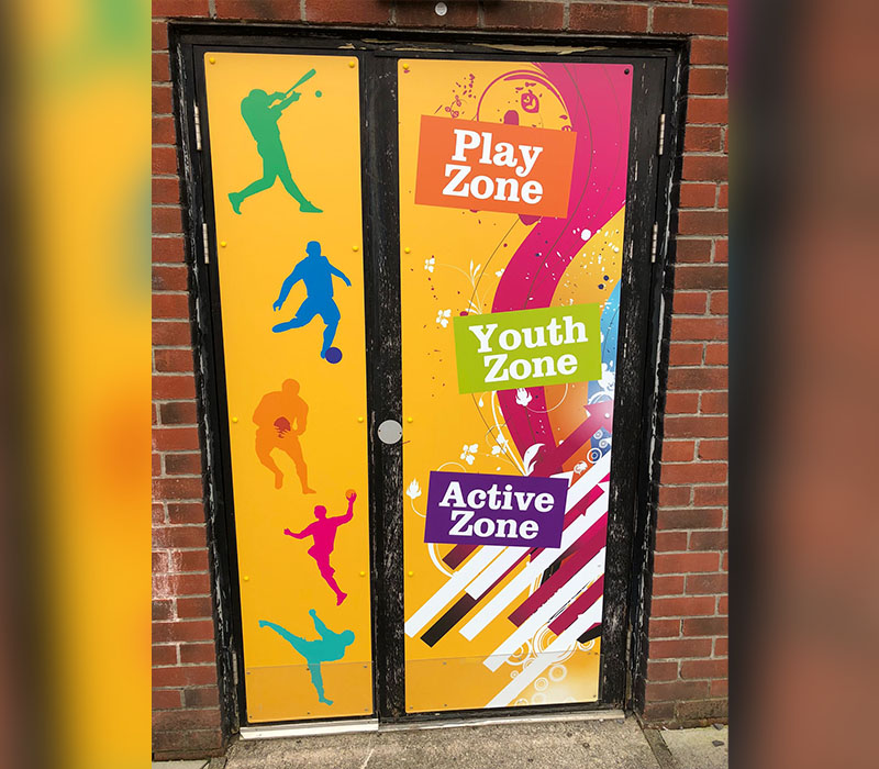 Colourful external signage, making this Young People’s Centre in Bolton look welcoming