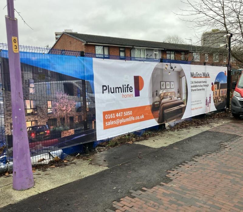 Mesh, soft fabric external advertising construction hoardings, printed & installed by Impression’s Greater Manchester team for Plumlife homes.