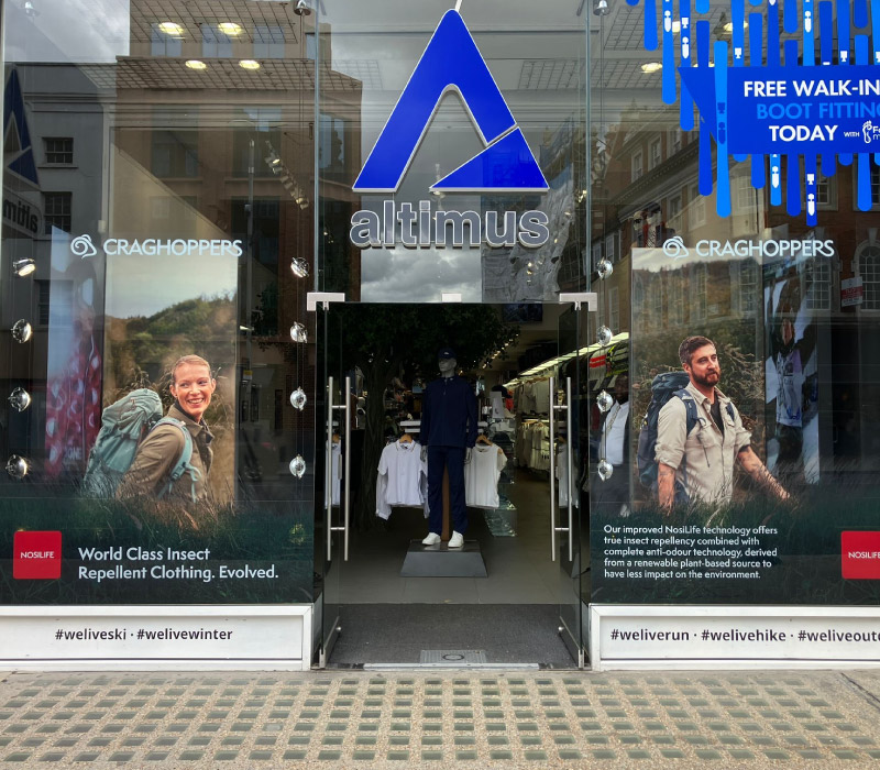 Photo of retail campaign window graphics printed and installed by Impression, Bolton