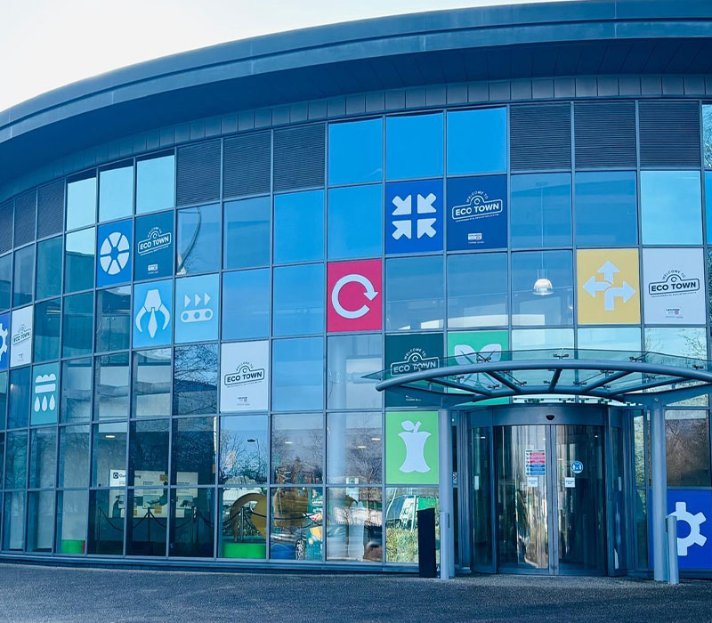 Hardwearing window vinyls on the exterior of the local authority’s Eco Town building entrance..