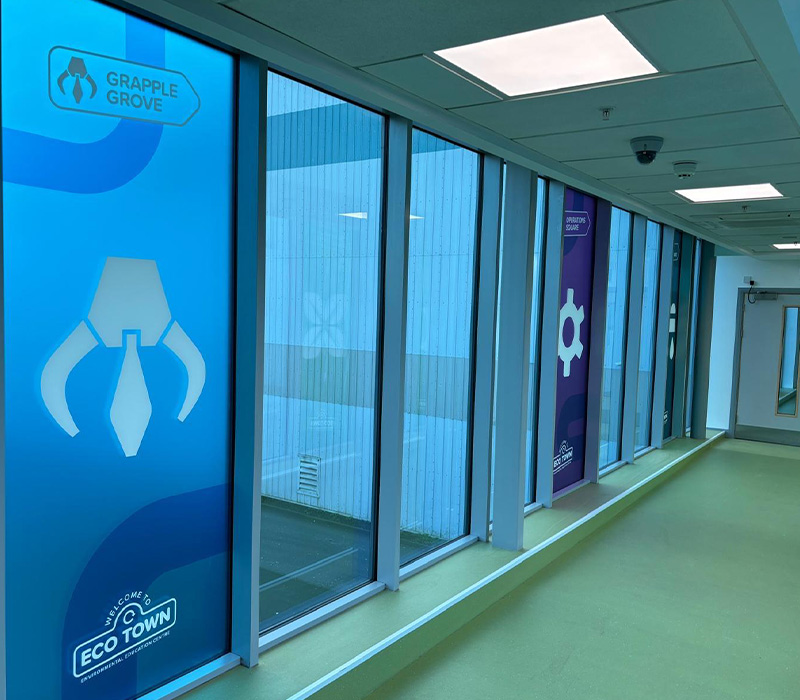 Crystal-clear window graphics printed and installed by Impression
