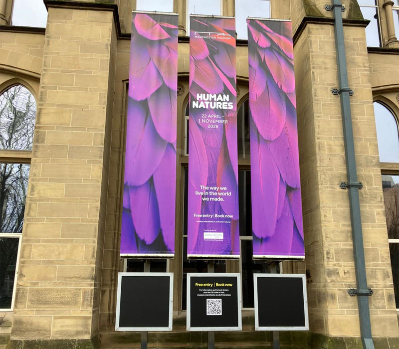Large format banners at Manchester Museum to promote its new exhibition, Human Natures.