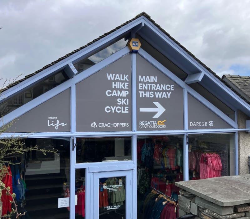 External wayfinding window vinyl installed by Impression for Regatta’s retail store in Hawkshead Village, Ambleside.