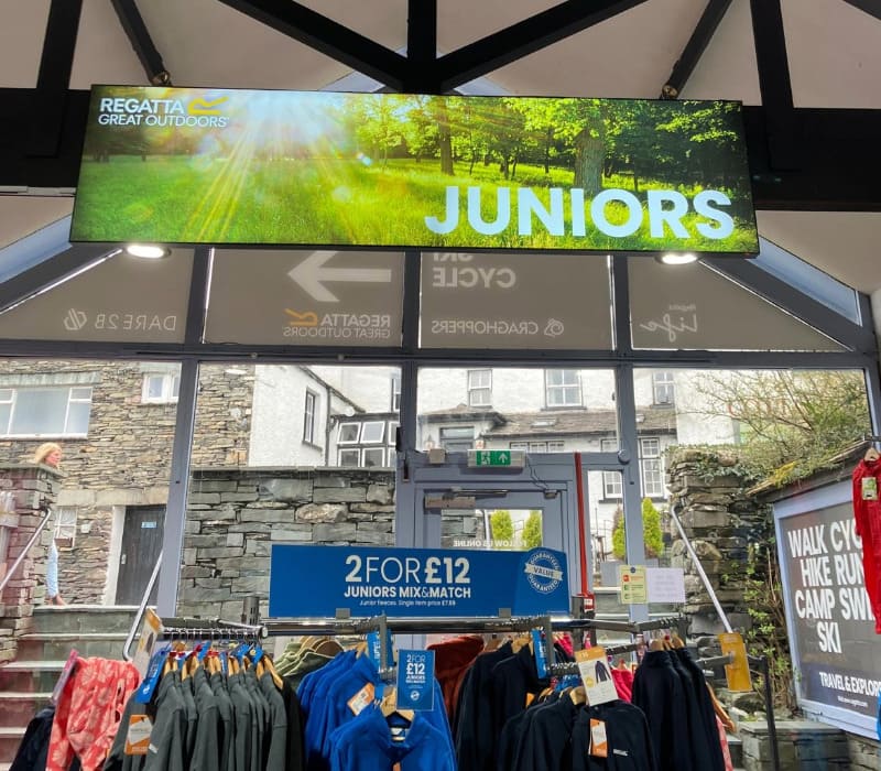 Impression installs internal signage for a Regatta retail store in Hawkshead Village, Ambleside, promoting its ‘juniors’ clothing range.