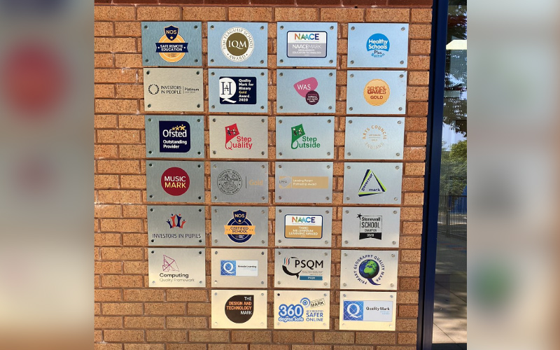 Brushed silver plaques designed printed and installed in greater manchester