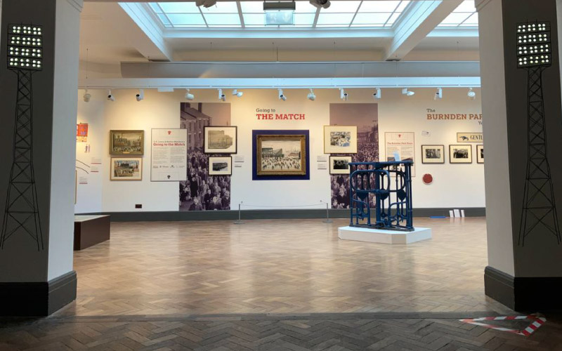 bespoke floodlights graphics to the exhibition entrance