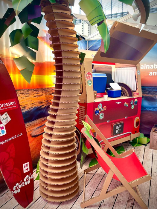 Beach themed display stand manufactured entirely from sustainable engineered cardboard